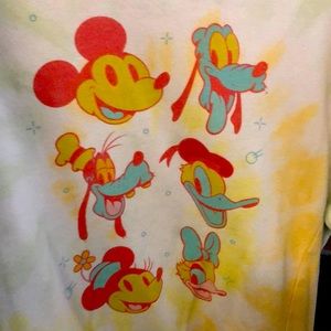 This is a Disney shirt hasn’t been worn it’s really stylish really pretty